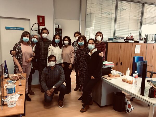 Eleven members of staff at the Spanish State Employment Service office, wearing face masks, gathered in the office where the experiment ran